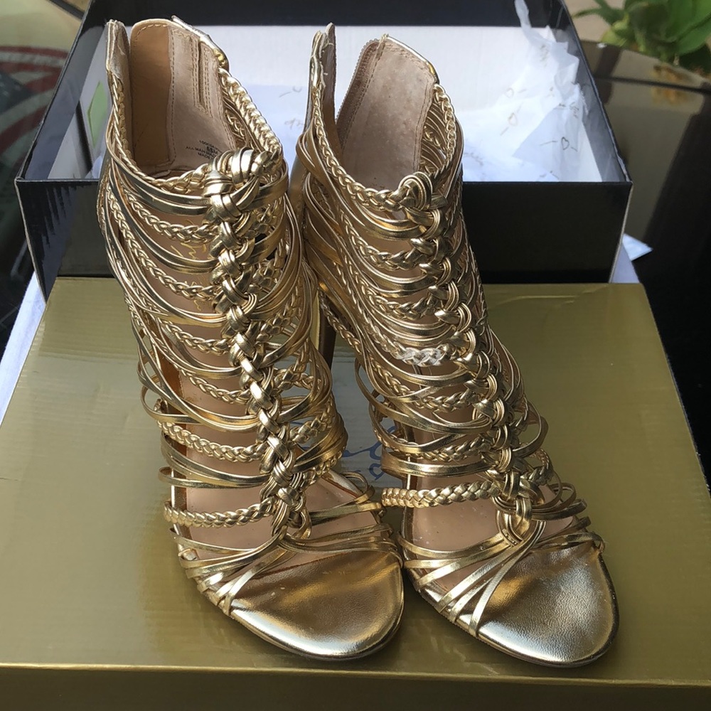Thalia Sodi gold size 6.5 wore once.
